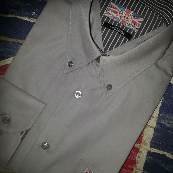 Grey shirt with grey stripe trim